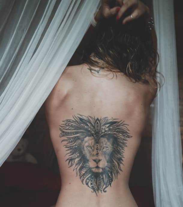 Lion tattoo idea for women