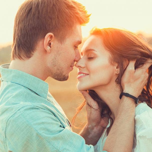 man kissing woman's nose woman smiling signs he's your soulmate