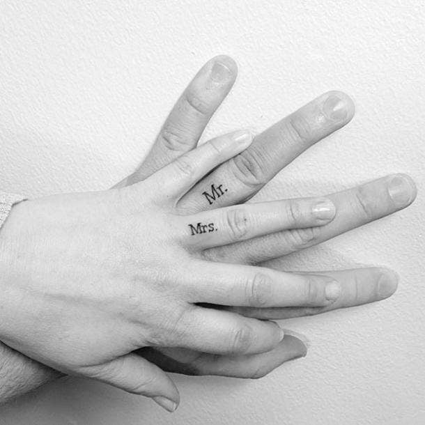 Mr and Mrs wedding ring tattoo