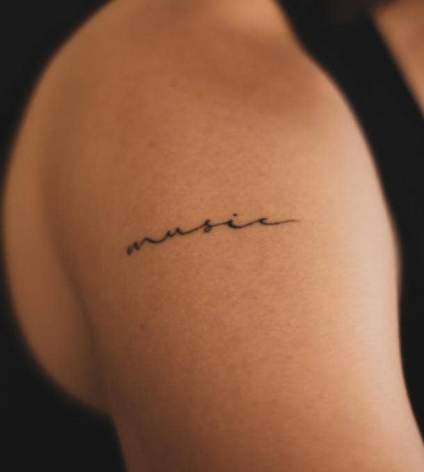 one word tattoo idea for women
