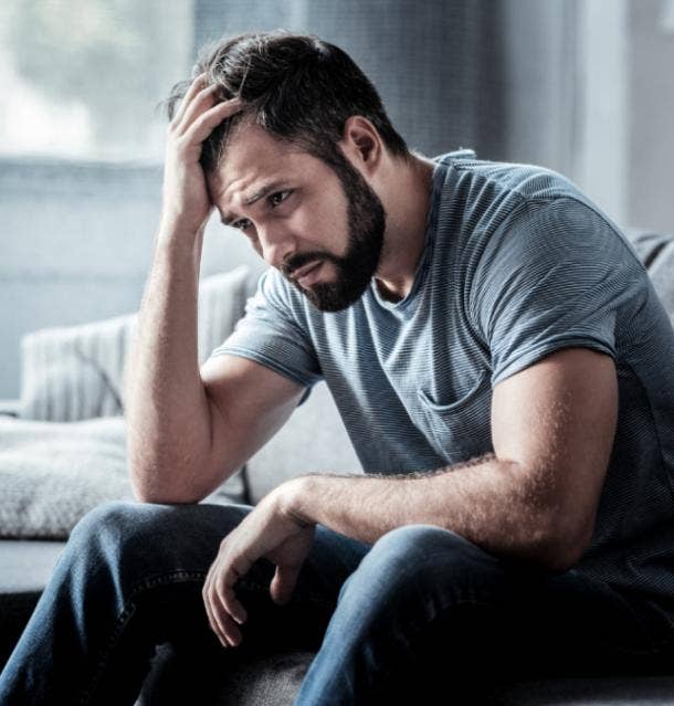 upset man with hand on his head