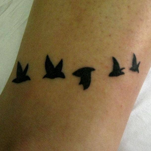small tattoos with big meaning flock of birds