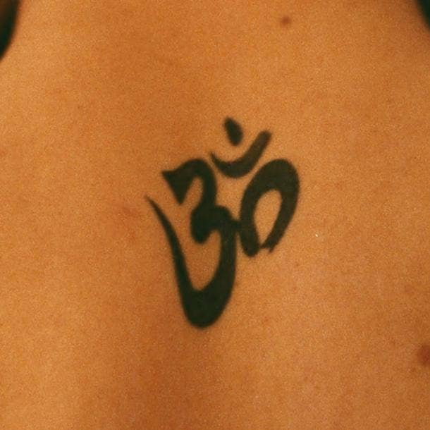 small tattoos with big meaning om