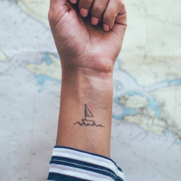 small tattoos with big meaning sailboat