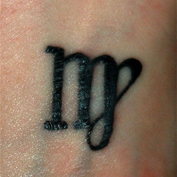 small tattoos with big meaning zodiac symbol