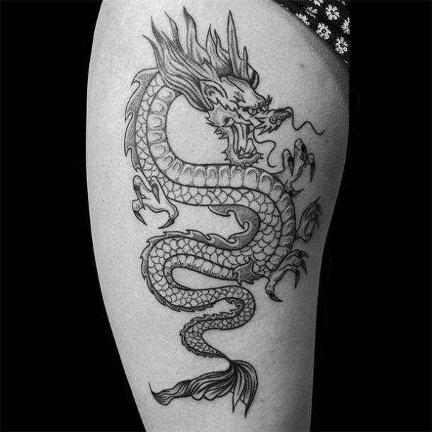 9 Most Stunning Tribal Dragon Tattoo Designs  Styles At Life