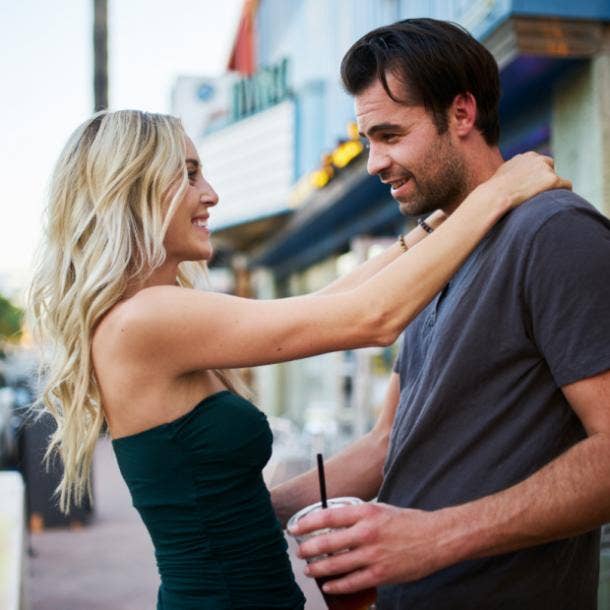 physical signs a woman is interested in you - smiling at you a lot