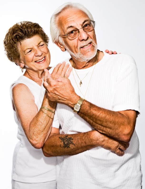 arm tattoo on an older man with his loving wife