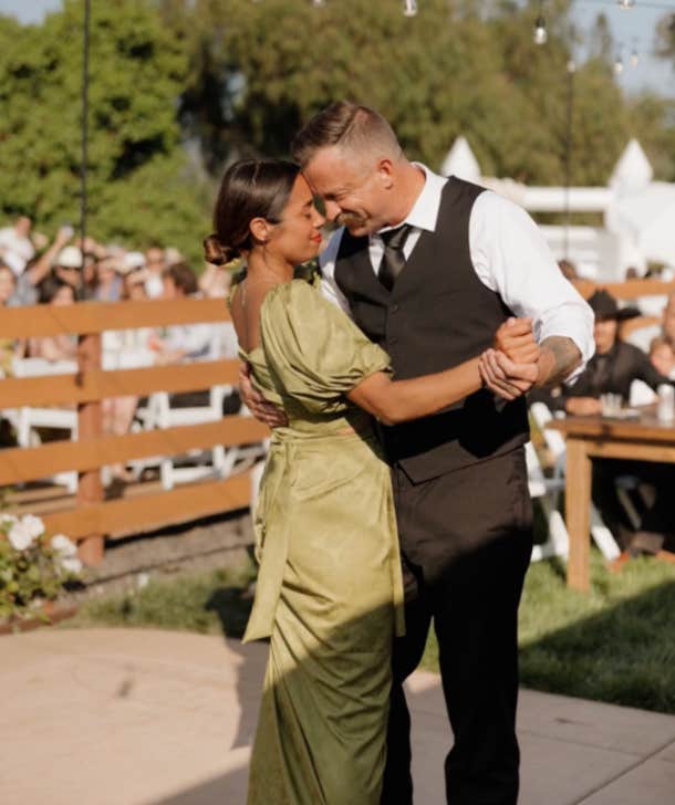 daughter lets parents have a first dance at her wedding because they eloped