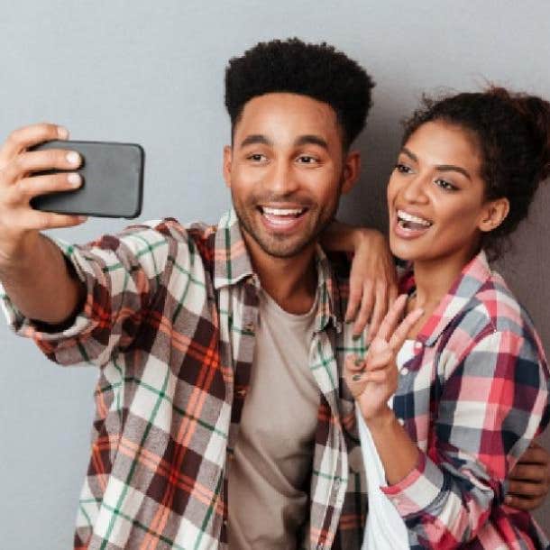 guy taking selfie with girl he likes