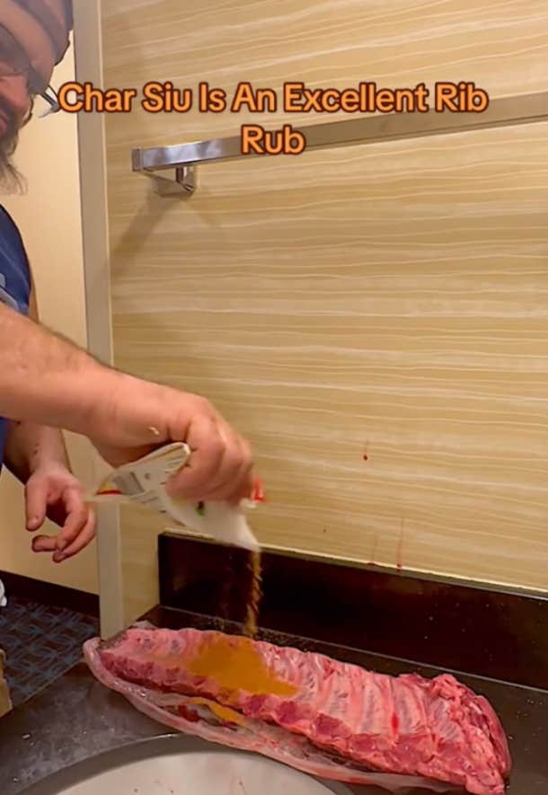 man makes baby back ribs recipe in hotel bathroom