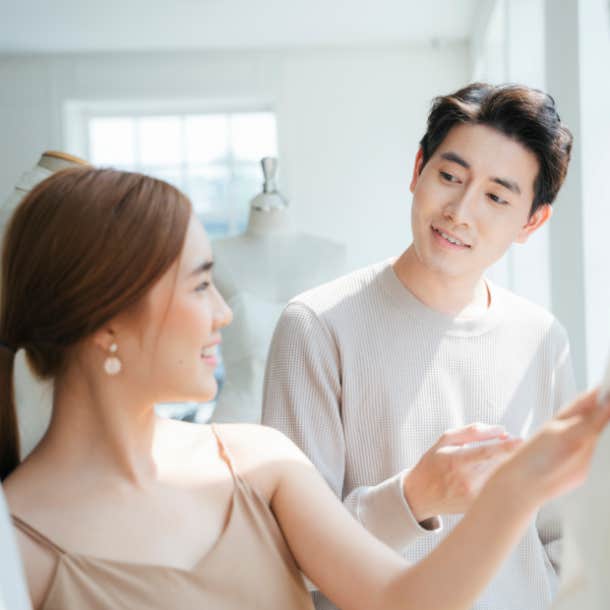 man smiling at woman he wants to marry