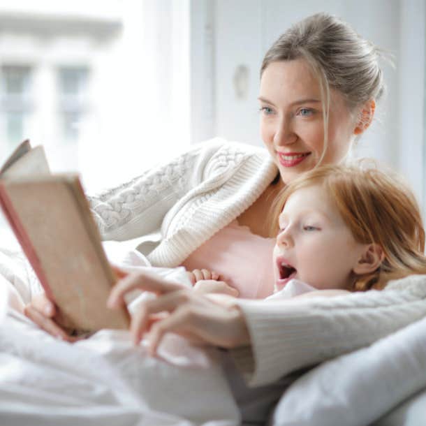 mom reading with daughter