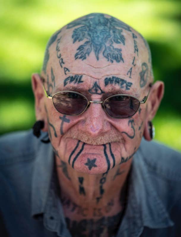 old man with face tattoos