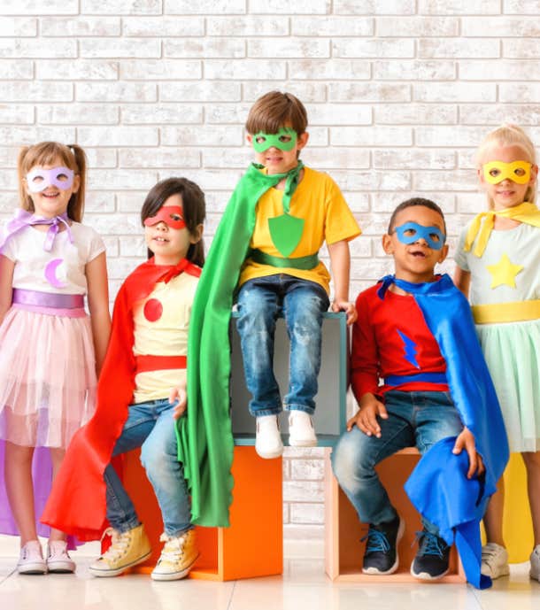 kids dressed as superheroes