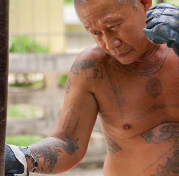 tattooed old boxer