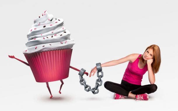 Woman chained to cupcake