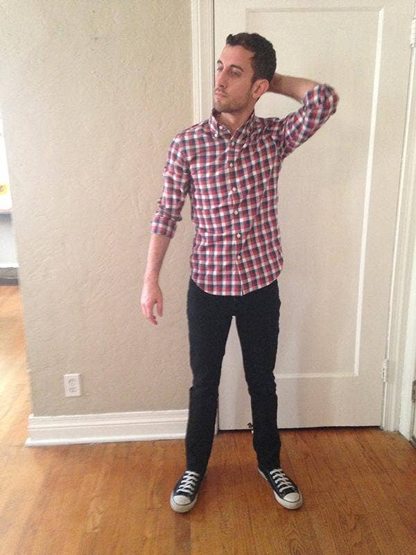 man in plaid shirt and jeans