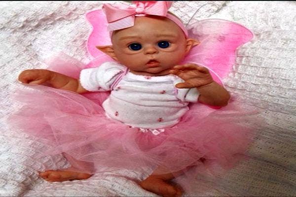 Elf baby in pink.