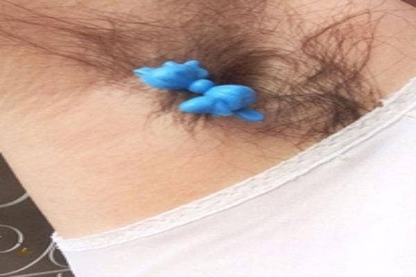 A blue toy in the underarm.