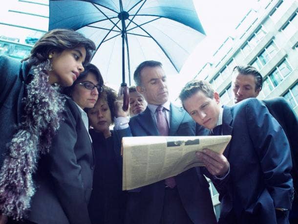 People reading the newspaper