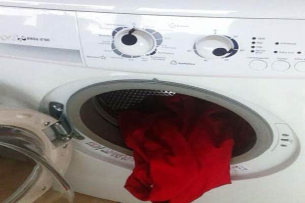 Dryer with red shirt.
