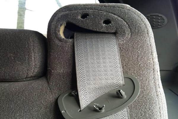 Car seat with face.