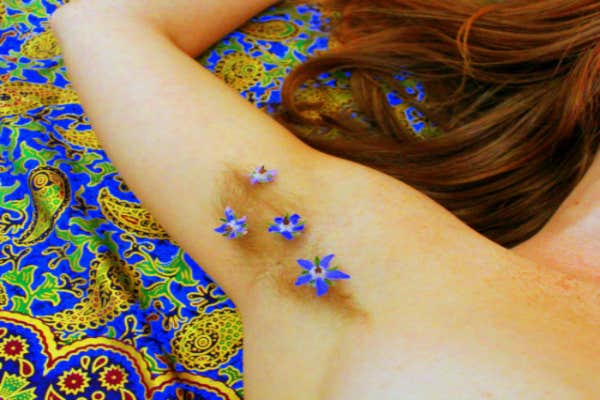 Wildflowers under an arm