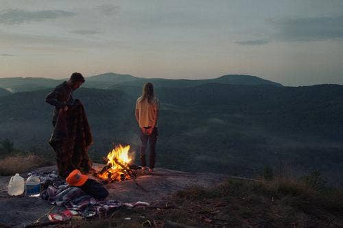 <b>1. Less than $250: Camping</b>
It may, at first, not seem like the most romantic honeymoon idea in the world, but camping — especially if you've never gone — can be quite an adventure. Depending on where you decide to pitch your tent, camping sites can run anywhere from $10 to $40 a night.
As long as you don't plan to dine on fois gras or caviar on your trip, and stick to camping-friendly groceries to cook over a fire, you can easily afford a few days with your new husband in the wilderness under the stars. Wishing on shooting stars is the epitome of romance, and romance done on the cheap. camping