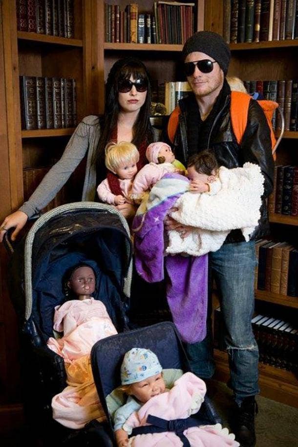 couple with baby costumes