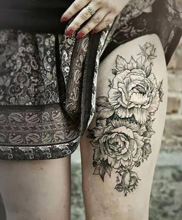 <strong>This floral thigh piece will impress all your friends when short season comes around.</strong> Tattoos For Her