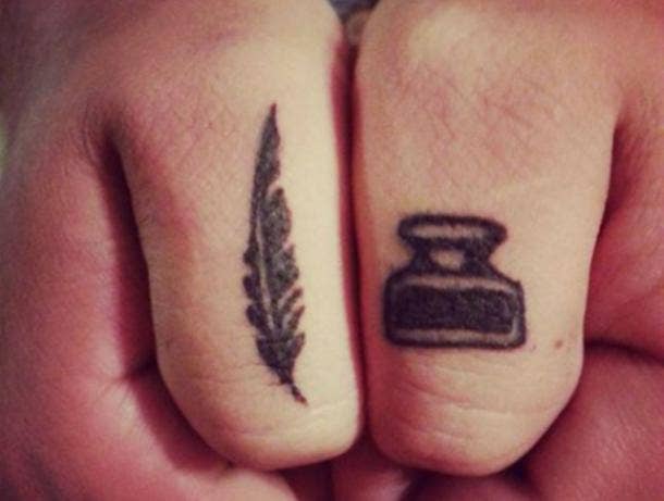 6. Quill and ink tiny tattoos