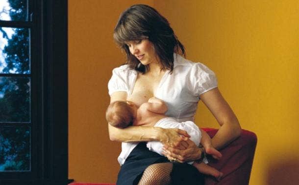 boobs Lucy Lawless breastfeeding
