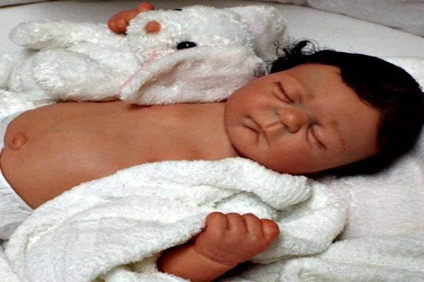 Baby with lots of hair.