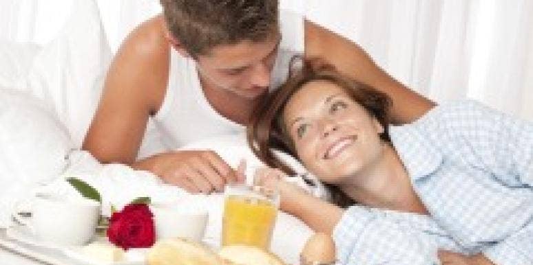 Dos and Don'ts For The Morning After Couple having breakfast in bed