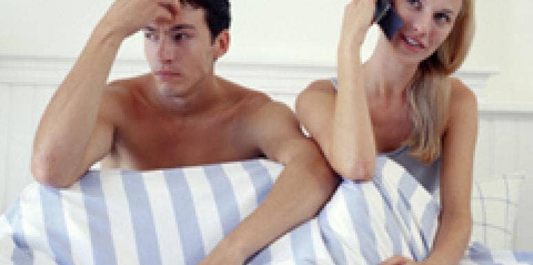 Woman on the phone in bed Woman on the phone in bed