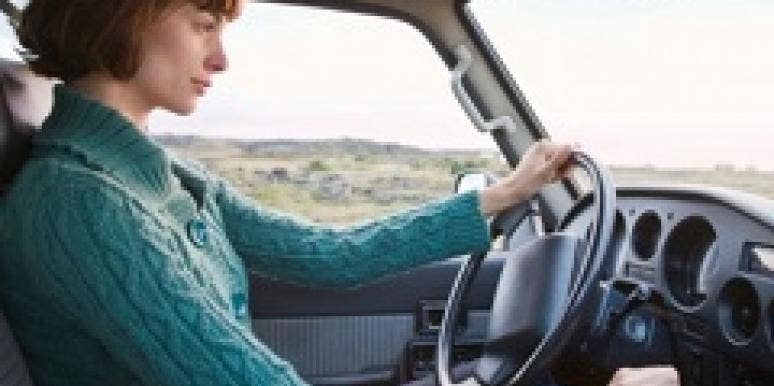 Girl driving in a car.