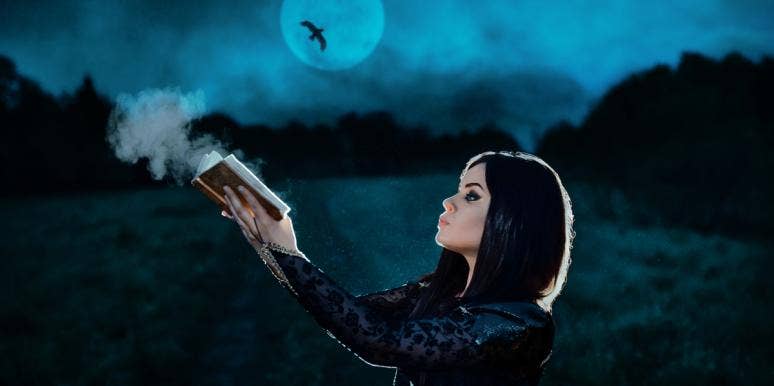 The 10 Best Books for the Resident Witch in Your Life — Recommended By Actual Witches woman holding book under moon