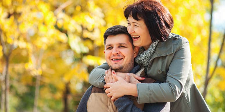 10 Guys Reveal The Best Love Advice Their Mom Ever Gave Them mother hugging adult son