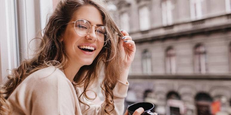 10 Signs You’re Happy From The Happiest People I’ve Ever Met smiling woman