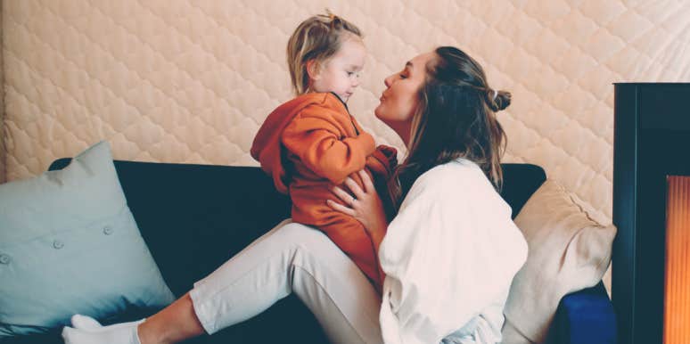 10 Things I Did As A New Parent That I Would Never, Ever Do Again mom holding daughter