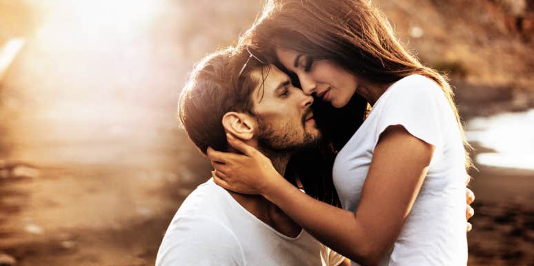11 Foolproof Ways To Win The Heart Of An Alpha Female woman cuddling man