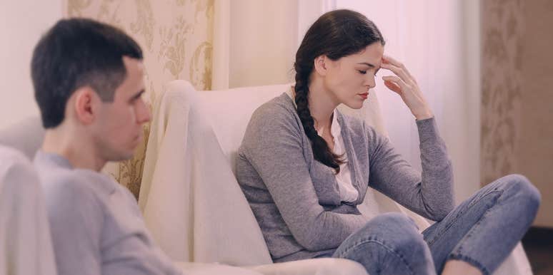 12 Huge Red Flags You're Drifting Apart From Your Spouse depressed couple