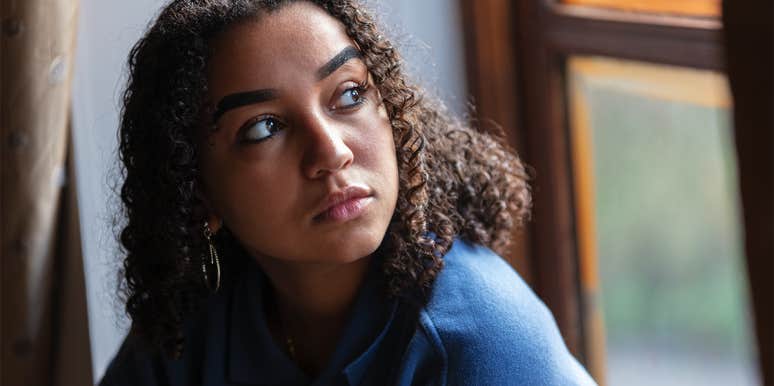 12 Signs You're An Emotional Masochist And Crave Abuse woman looking out window