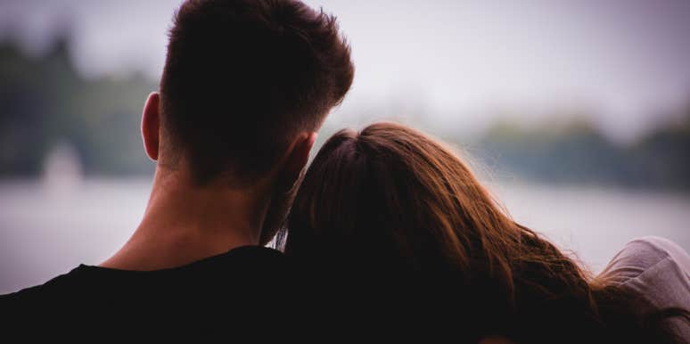 12 Brutal Truths About Loving Someone Who's Been Single Forever woman leaning on man