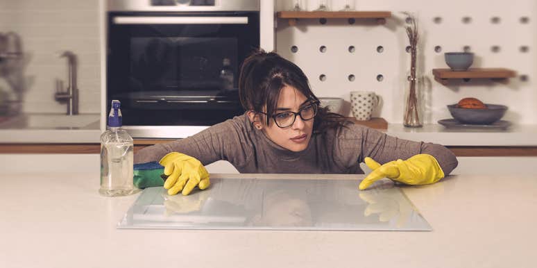 13 Subtle Signs Of OCD — And What To Do About It woman whipping the table