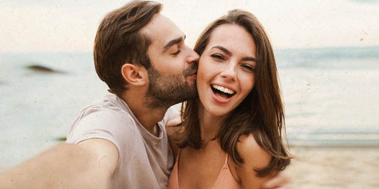 If He Exhibits 15 Behaviors, Congrats! He Genuinely Likes You man, kissing a woman, by the beach