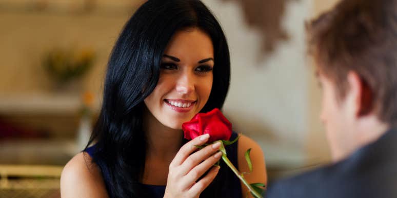 15 Simple Gestures That Truly Reveal He Loves You man giving woman rose