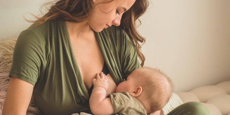 15 Ways Breastfeeding Completely Messes With Your Sanity woman breastfeeding baby
