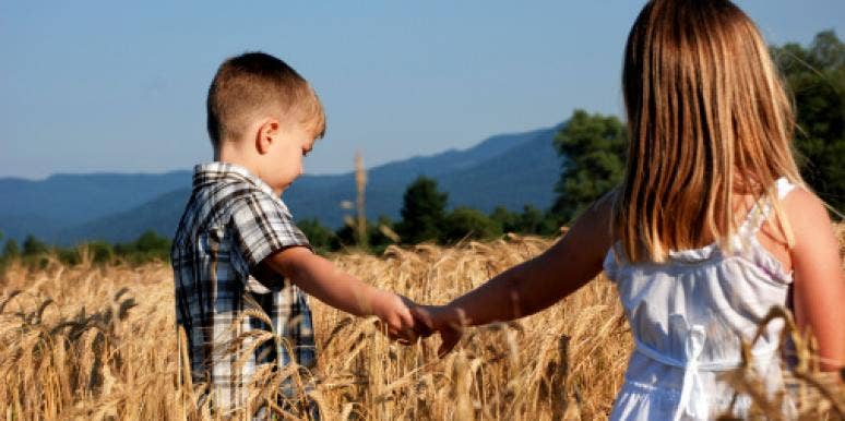 Boy and girl holding hands Boy and girl holding hands